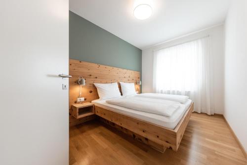 Ένα ή περισσότερα κρεβάτια σε δωμάτιο στο Villa am Gries