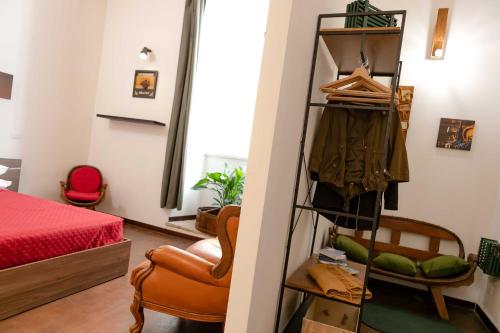 Una cama o camas en una habitación de MyWay Colosseo Apartment