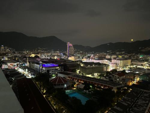 a view of a city at night with lights at Patong Beach Top Location in Patong Beach