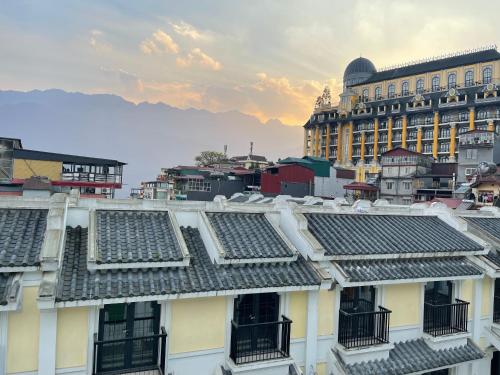 a view of a building with solar panels on the roof at Moonlight Hotel Sa Pa in Sa Pa