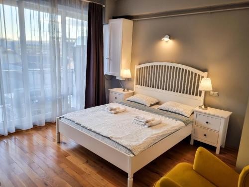 Krevet ili kreveti u jedinici u okviru objekta Traian Apartment - Cluj