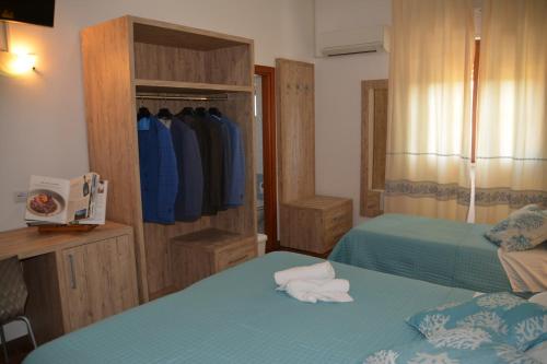 Katil atau katil-katil dalam bilik di Hotel Citti