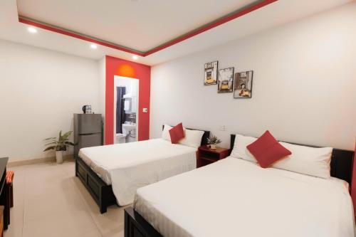 Postelja oz. postelje v sobi nastanitve KEVIN HOTEL