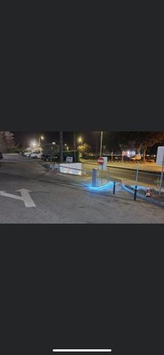a picture of a parking lot at night at NayJay Staycation in Portimão
