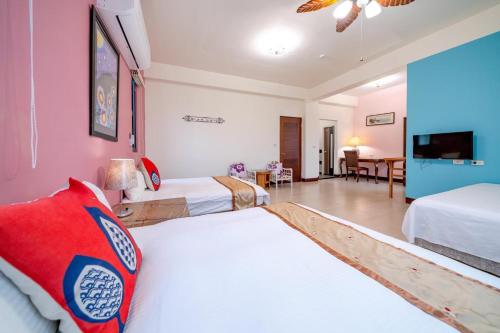 Katil atau katil-katil dalam bilik di Bo Jue Farm Stay