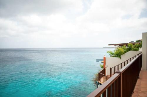 a view of the ocean from a building at Lagun Ocean View Villa with Own Private Beach in Willemstad