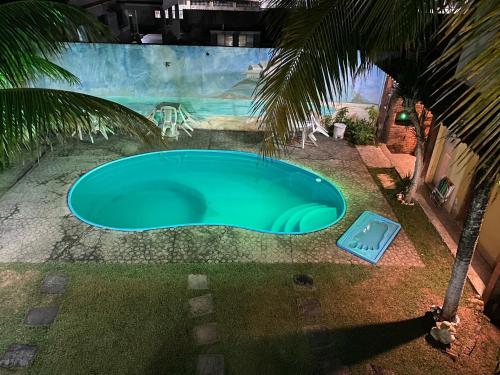 Πισίνα στο ή κοντά στο Casa de Praia Suítes