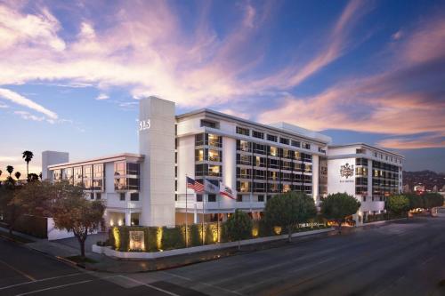 a rendering of a building with a street in front at SLS Hotel, a Luxury Collection Hotel, Beverly Hills in Los Angeles