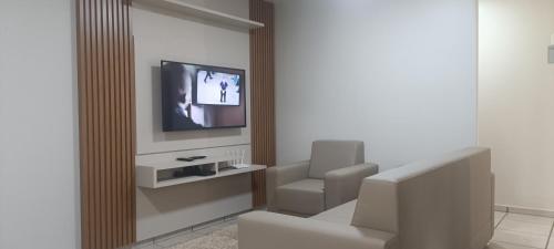 TV a/nebo společenská místnost v ubytování Hotel Pires Faxinal