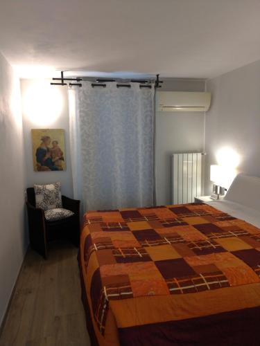 Un pat sau paturi într-o cameră la Poggio Gherardo