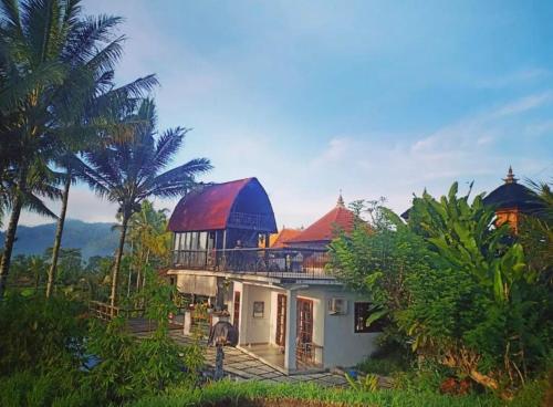 a house with a dome on top of it at Jero Tumbuk Private Villa in Selat