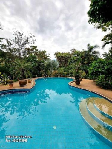 The swimming pool at or close to PURO Pool villa Korat ปูโร พูลวิลล่า เมืองโคราช