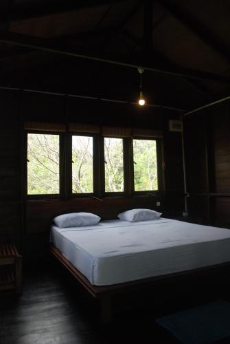 En eller flere senge i et værelse på Elephant Entrance