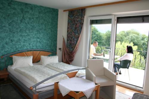 Ένα ή περισσότερα κρεβάτια σε δωμάτιο στο Haus Rattenböck