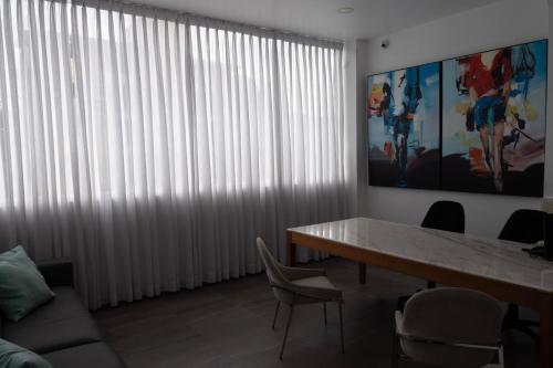 Zona de estar de Palmer Suites