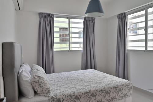 Cama o camas de una habitación en Palmer Suites