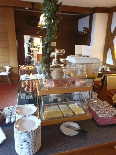 a table with a buffet of food on a counter at Hotel Hochland in Leutasch