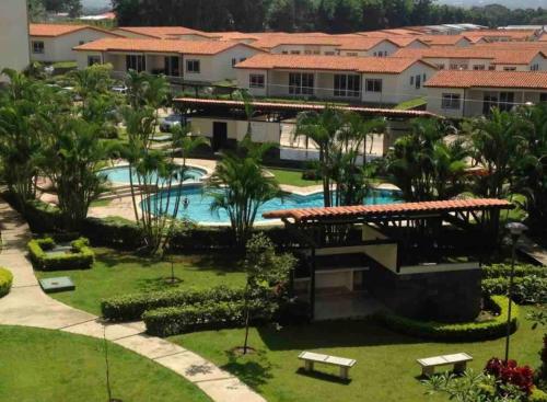 an aerial view of a resort with a swimming pool at Beautiful Apartment w/ Balcony Family Friendly in San Rafael