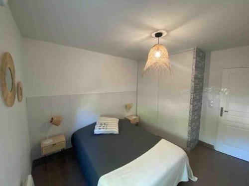 Posteľ alebo postele v izbe v ubytovaní Très bel appartement contemporain et calme