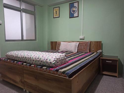 Katil atau katil-katil dalam bilik di Nuzong Lee Homestay