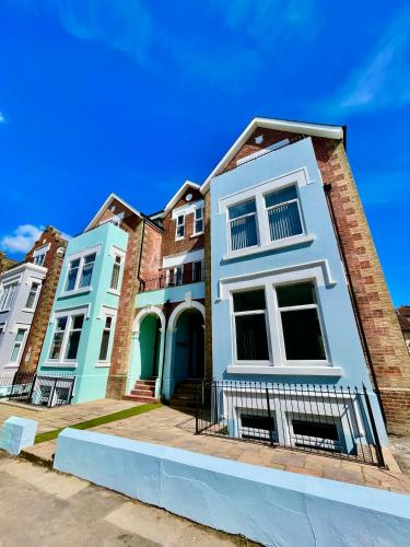 a row of houses on a street at Sea Breeze - Coast in Bournemouth