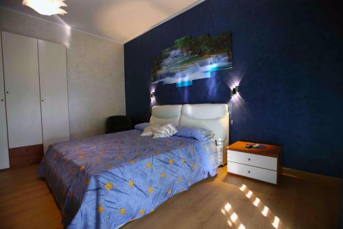 A bed or beds in a room at B&B Villa Magna Grecia