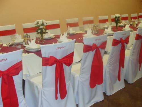a group of tables with red ties on them at Lugarnica in Zagreb