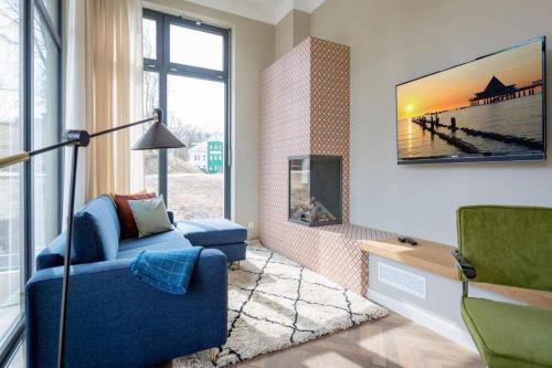 TV a/nebo společenská místnost v ubytování Villa Bellevue App 04