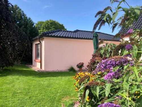 Κήπος έξω από το Ferienhaus Swantje