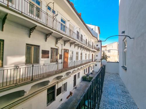 a view of an alley between two buildings at Hlavna Apartment Kosice in Košice