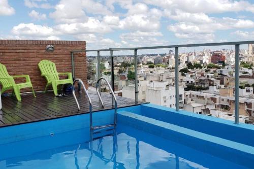 a balcony with a view of a city at Campillo 988 in Córdoba