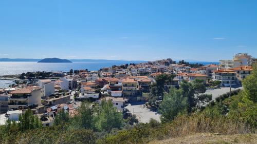 a view of a town next to the water at Toroni Pearl in Toroni