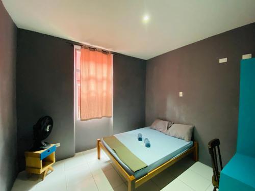 Reef Hostel & Pousadaにあるベッド
