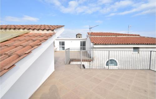a view from the balcony of a house with a roof at Casa Cristina in Policastro Bussentino