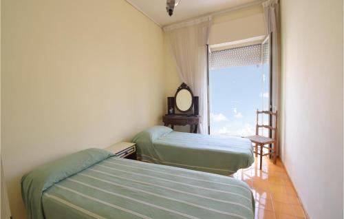 מיטה או מיטות בחדר ב-Casa Cristina