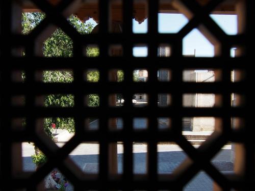 uma vista a partir de uma janela de um edifício em Hotel ASL em Bukhara