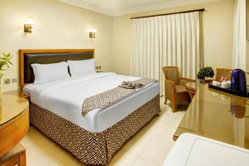 Кровать или кровати в номере Dweik Hotel LUXURY 3