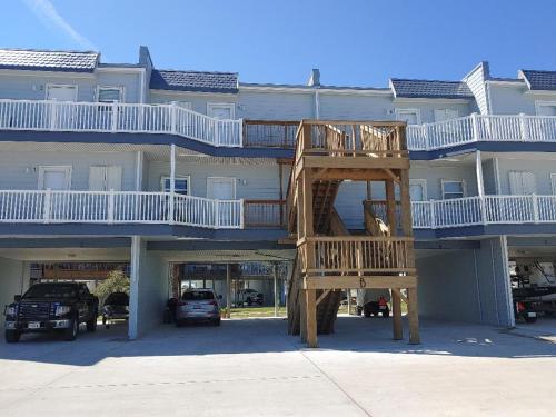 a wooden staircase in front of a building at Bay Tree B4 in Port Aransas