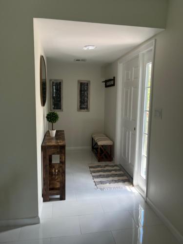 a hallway with a door leading into a room at Great location with lake view in Naples