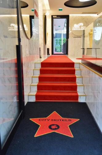a star on the floor of a star hallway with a red carpet at Lisbon City Hollywood Hotel by City Hotels in Lisbon