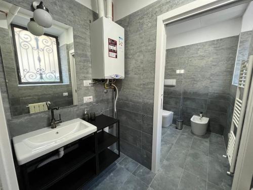 Koupelna v ubytování Loft Matteotti - Studio in centro