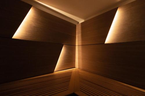 a room with a wall with lights on it at A-ROSA Hotel Ceres am Meer - Adults Only in Binz