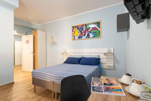 Posteľ alebo postele v izbe v ubytovaní RomeCookSea Guesthouse