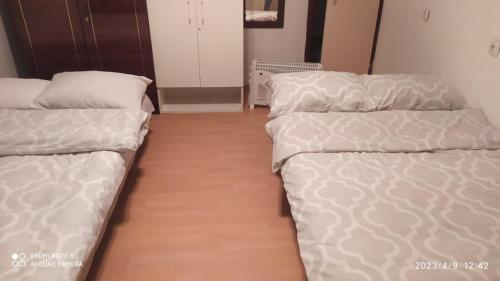 Ein Bett oder Betten in einem Zimmer der Unterkunft Topli kutak Banja Luka