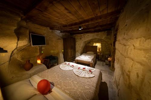 Katil atau katil-katil dalam bilik di feris cave hotel
