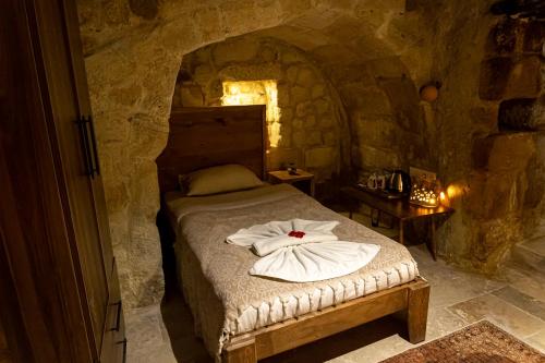 Katil atau katil-katil dalam bilik di feris cave hotel