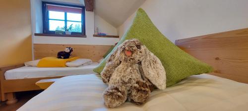 Postel nebo postele na pokoji v ubytování Hotel Gasthof Gribelehof