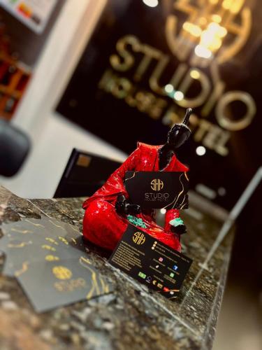 a small toy sitting on a counter top at House Studio Hotel in Bogotá