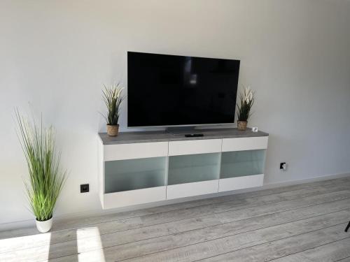 TV a/nebo společenská místnost v ubytování Baltic Nr. 3