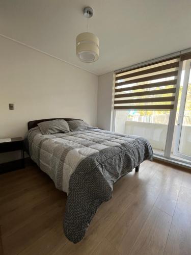 Voodi või voodid majutusasutuse Departamento en exclusiva zona residencial de Concepción toas